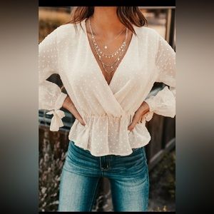 Long sleeve cream blouse